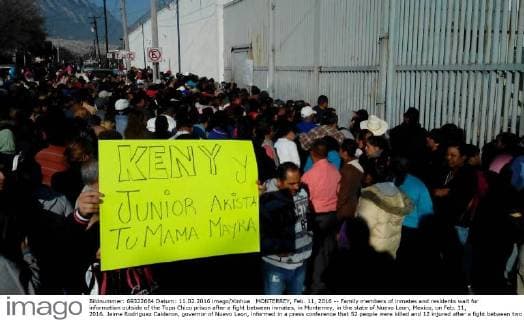 MONTERREY, Feb. 11, 2016 -- Family members of inmates and residents wait for information outside of the Topo Chico prison after a fight between inmates, in Monterrey, in the state of Nuevo Leon, Mexico, on Feb. 11, 2016. Jaime Rodriguez Calderon, governor of Nuevo Leon, informed in a press conference that 52 people were killed and 12 injured after a fight between two rival fractions of inmates broke in the Topo Chico prison. Str) (ce) MEXICO-MONTERREY-SECURITY-PRISON e STR 