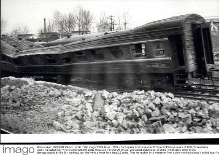 1976 - Earthquake First Ucensored Pictures of Chinese quake of 1976 To Reach the west : Tangahan City Where Up to 500,000 Died: These are the first UN official, unensored pictures out of china -which show some of the damage caused by the July earthquakes- the world s worst for a least 12 years. They weretaken by a westerner from a slow moving train as it pulled away from the industrial city of Tangshan, epicentre of the Earthquake, 100 ,miles east of Peking. A Million people lived in the city before the quake and the death toll has been put at 100,000 by official Chinese Sources and at 500,000 by foreign estimates. The natural phenomenon was made worse by a man-made one- a honeycomb of coal mine below the city. Their Collapse as violent tremors shook the city opened up vast sink-holes int which an entire hospital and a train are said to have disappeared. The railway system in and around - ZUMAk09_