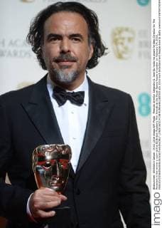Mexican director Alejandro G. Inarritu holds his award for Best Director for The Revenant in the winner s room at the EE British Academy Film Awards at the Royal Opera House in London on February 14, 2016.  LON20160214138 RUNExHELLESTAD