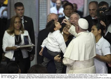 NO FRANCE - NO SWITZERLAND: February 14 2016 : Pope Francis gives drop of medicine to five-year-old Rodrigo Lopez Miranda, during his visit to the Federico Gomez Pediatric Hospital, in Mexico City. EDITORIAL USE ONLY NOT FOR MARKETING OR ADVERTISING CAMPAIGNS  Â©ServizioFotograficoOR CPP