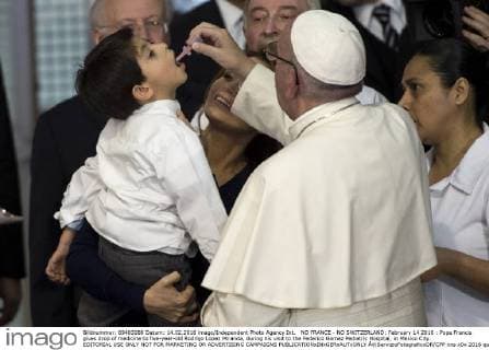 NO FRANCE - NO SWITZERLAND: February 14 2016 : Pope Francis gives drop of medicine to five-year-old Rodrigo Lopez Miranda, during his visit to the Federico Gomez Pediatric Hospital, in Mexico City. EDITORIAL USE ONLY NOT FOR MARKETING OR ADVERTISING CAMPAIGNS  Â©ServizioFotograficoOR CPP