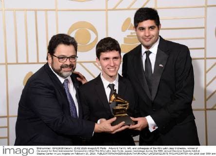 Arturo O Farrill, left, and colleagues of the Afro Latin Jazz Orchestra, winner of the award for Best Instrumental Composition titled The Afro Latin Jazz Suite, appear backstage during the 58th annual Grammy Awards held at Staples Center in Los Angeles on February 15, 2016.  LAP20160215876 PHILxMCCARTEN