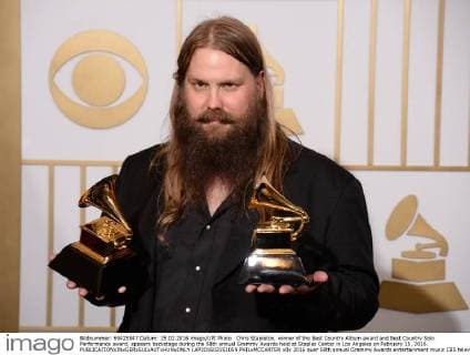 Chris Stapleton, winner of the Best Country Album award and Best Country Solo Performance award, appears backstage during the 58th annual Grammy Awards held at Staples Center in Los Angeles on February 15, 2016.  LAP201602151059 PHILxMCCARTEN