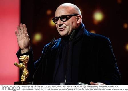 (160220) -- BERLIN, Feb. 20, 2016 -- Italian director Gianfranco Rosi speaks as he receives the Golden Bear for Best Film for the film Fire at Sea during the awards ceremony of the 66th Berlinale International Film Festival in Berlin, Germany, Feb. 20, 2016. The Italian documentary film Fire at Sea won the Golden Bear, the top jury prize awarded to the best film, in the 66th Berlin International Film Festival on Saturday. ) GERMANY-BERLIN-BERLINALE INTERNATIONAL FILM FESTIVAL-AWARDS CEREMONY-GOLD BEAR-GIANFRANCO ROSI ZhangxFan 