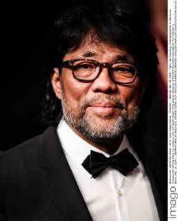 (160220) -- BERLIN, Feb. 20, 2016 -- Mark Lee Ping-Bing, Cinematographer of the movie Crosscurrent (Chang Jiang Tu), poses on the red carpet ahead of the awards ceremony of the 66th Berlinale International Film Festival in Berlin, Feb. 20, 2016. ) GERMANY-BERLIN-BERLINALE INTERNATIONAL FILM FESTIVAL-AWARDS CEREMONY ZhangxFan 