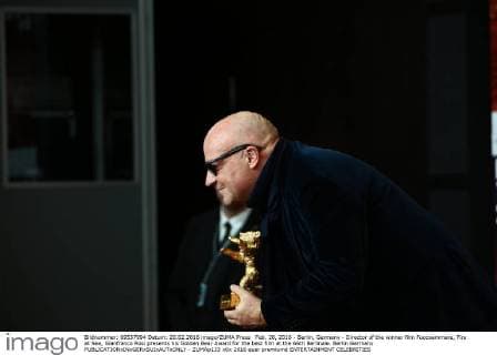 Feb. 20, 2016 - Berlin, Germany - Director of the winner film Fuocoammare, Fire at Sea, Gianfranco Rosi presents his Golden Bear Award for the best film at the 66th Berlinale. Berlin Germany - ZUMAp133