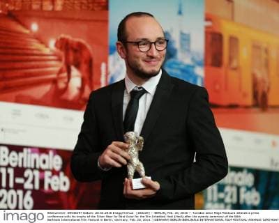 (160220) -- BERLIN, Feb. 20, 2016 -- Tunisian actor Majd Mastoura attends a press conference with his trophy of the Silver Bear for Best Actor for the film Inhebbek Hedi (Hedi) after the awards ceremony of the 66th Berlinale International Film Festival in Berlin, Germany, Feb. 20, 2016. ) GERMANY-BERLIN-BERLINALE INTERNATIONAL FILM FESTIVAL-AWARDS CEREMONY LuoxHuanhuan 