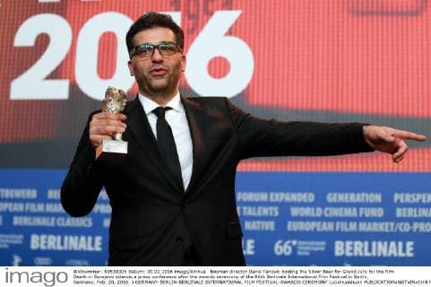 Bosnian director Danis Tanovic holding the Silver Bear for Grand Jury for the film Death in Sarajevo attends a press conference after the awards ceremony of the 66th Berlinale International Film Festival in Berlin, Germany, Feb. 20, 2016. ) GERMANY-BERLIN-BERLINALE INTERNATIONAL FILM FESTIVAL-AWARDS CEREMONY LuoxHuanhuan 