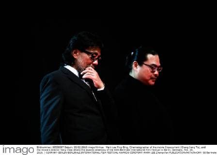 Mark Lee Ping-Bing, Cinematographer of the movie Crosscurrent (Chang Jiang Tu), and the movie s director Yang Chao attend the awards ceremony of the 66th Berlinale International Film Festival in Berlin, Germany, Feb. 20, 2016. ) GERMANY-BERLIN-BERLINALE INTERNATIONAL FILM FESTIVAL-AWARDS CEREMONY-MARK LEE ZhangxFan 
