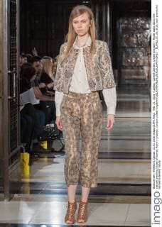 Feb. 21, 2016 - London, Covent Garden, United Kingdom - Model walks down the catwalk wearing House of Kamair Rokni s creation. London United Kingdom - ZUMAp133