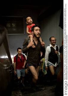 Residents take part in the seventh edition of the event No Pants Subway Ride at a subway platform in Mexico City, capital of Mexico, on Feb. 21, 2016. ) (vf) (ah) MEXICO-MEXICO CITY-SOCIETY-NO PANTS SUBWAY RIDE PedroxMera 