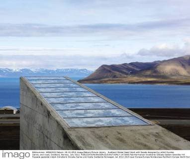 Svalbard Global Seed Vault with facade designed by artist Dyveke Sanne, and coast, Svalbard, Norway, July 2012.  1473695 PalxHermansen