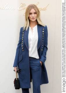 English model Rosie Huntington-Whiteley attending the Burberry Prorsum Womenswear A W 2016 on West Albert Lawn in Kensington Gardens, London. FEBRUARY 22nd 2016  PTYx16459
