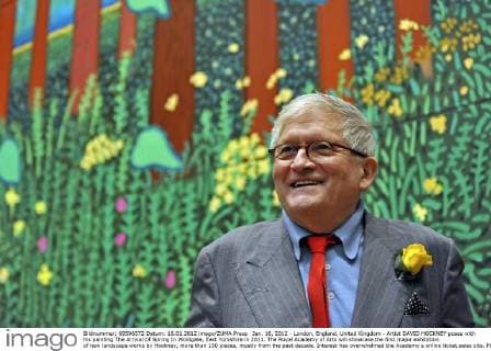 Jan. 16, 2012 - London, England, United Kingdom - Artist DAVID HOCKNEY poses with his painting The Arrival Of Spring In Woldgate, East Yorkshire in 2011. The Royal Academy of Arts will showcase the first major exhibition of new landscape works by Hockney, more than 150 pieces, mostly from the past decade. Interest has overwhelmed the Academy s online ticket sales site.  - ZUMAl94_