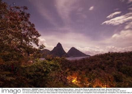 View of the Pitons at night during full moon, Gros and Petit Piton, from Anse Chastenet, Saint Lucia. April 2014.  1475454 SamxHobson