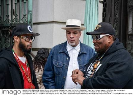 Feb. 25, 2016 - Manhattan, New York, United States - (R) Africa Bambaataa and members of Zulu Nation outside of 31 Chambers st. during a public hearing to sign intro 1054 in relation to the co-naming of 42 thoroughfares and public spaces like Hip Hop Blvd in the Bronx. Manhattan United States - ZUMAp133