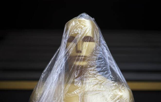 An Oscar Statue is covered in protective plastic on the red carpet as preparations are underway for the 88th Academy Awards, at the Dolby Theatre in the Hollywood section of Los Angeles on February 27, 2016. The Academy Awards will take place on Sunday, February 28, 2016.  LAP20160227301 KEVINxDIETSCH