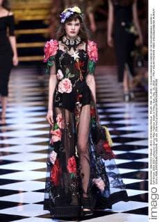 MILAN, Feb. 28, 2016 -- A model presents a creation at the Dolce&Gabbana women s Fall-Winter 2016-2017 collection during Milan Fashion Week in Milan, Italy, Feb. 28, 2016. ) ITALY-MILAN-FASHION WEEK-DOLCE&GABBANA-RUNWAY JinxYu 