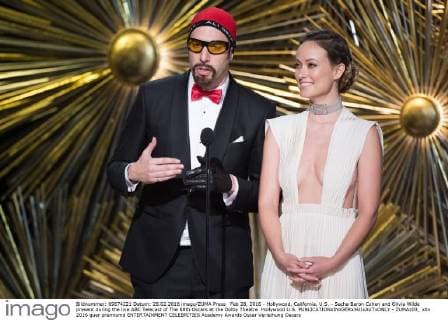 Feb 28, 2016 - Hollywood, California, U.S. - Sacha Baron Cohen and Olivia Wilde present during the live ABC Telecast of The 88th Oscars at the Dolby Theatre. Hollywood U.S. - ZUMAz03_