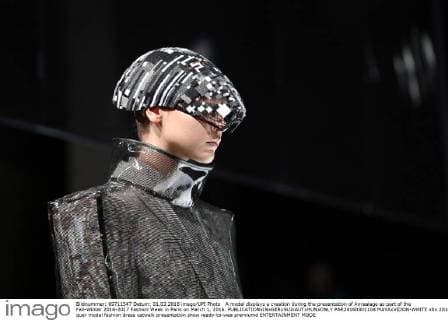 A model displays a creation during the presentation of Anrealage as part of the Fall-Winter 2016-2017 Fashion Week in Paris on March 1, 2016.  PAR20160301104 MAYAxVIDON-WHITE
