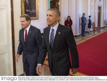 President Barack Obama (R) walks with Nick Saban, head football coach of the University of Alabama, as the two arrive for an event where Obama honored the 2015- 2016 College Football Playoff National Champion Alabama Crimson Tide, in the East Room at the White House in Washington, D.C. on March 2, 2016.  WAP20160302337 KEVINxDIETSCH