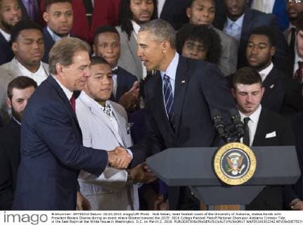 Nick Saban, head football coach of the University of Alabama, shakes hands with President Barack Obama during an event where Obama honored the 2015- 2016 College Football Playoff National Champion Alabama Crimson Tide, in the East Room at the White House in Washington, D.C. on March 2, 2016.  WAP20160302342 KEVINxDIETSCH
