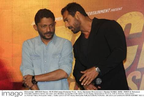 Rocky Handsome Filmpremiere in Mumbai MUMBAI, INDIA - MARCH 4: Bollywood filmmaker Nishikant Kamat with actor John Abraham during the trailer launch of film Rocky Handsome on March 4, 2016 in Mumbai, India.(Photo by Pramod Thakur Hindustan Times ) Trailer Launch Of Film Rocky Handsome