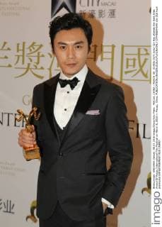 MACAU, CHINA - MARCH 08: (CHINA OUT) Actor Qin Hao attends the Gold Aries Award Of Macau International Film Festival on March 8, 2016 in Macau, China.  CFP480844646