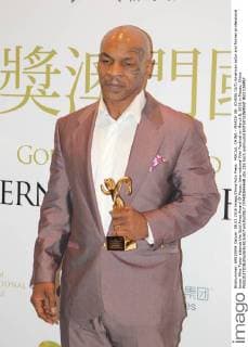 MACAU, CHINA - MARCH 08: (CHINA OUT) American actor and former professional boxer Mike Tyson attends the Gold Aries Award Of Macau International Film Festival on March 8, 2016 in Macau, China.  CFP480844648