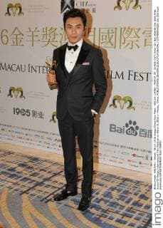 MACAU, CHINA - MARCH 08: (CHINA OUT) Actor Qin Hao attends the Gold Aries Award Of Macau International Film Festival on March 8, 2016 in Macau, China.  CFP480844655