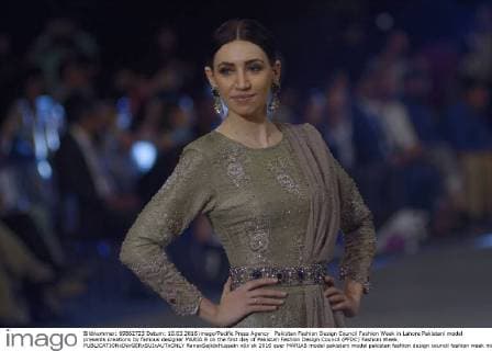 Pakistan Fashion Design Council Fashion Week in Lahore Pakistani model presents creations by famous designer MARIA.B on the first day of Pakistan Fashion Design Council (PFDC) Fashion Week.  RanaxSajidxHussain