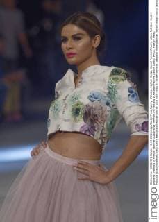 Pakistan Fashion Design Council Fashion Week in Lahore Pakistani model presents creations by famous designer SUBLIME by SARA on the first day of Pakistan Fashion Design Council (PFDC) Fashion Week.  RanaxSajidxHussain