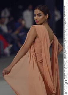 Pakistan Fashion Design Council Fashion Week in Lahore Pakistani model presents creations by famous designer SUBLIME by SARA on the first day of Pakistan Fashion Design Council (PFDC) Fashion Week.  RanaxSajidxHussain