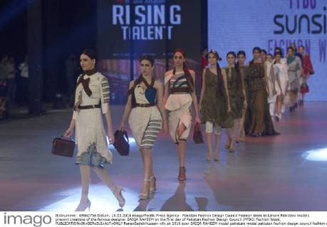 Pakistan Fashion Design Council Fashion Week in Lahore Pakistani models present creations of the famous designer SAIQA RAHEEM on the first day of Pakistan Fashion Design Council (PFDC) Fashion Week.  RanaxSajidxHussain