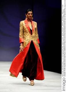March 11, 2016 - Jakarta, Indonesia - JAKARTA, INDONESIA - MARCH 10: A model showcases designs by Poppy Dharsono during The 5th Indonesia Fashion Week at Jakarta Convention Centre on March 10, 2016 in Jakarta, Indonesia. The 5th Indonesia Fashion Week theme is Reflections of Culture, as local culture and tradition will be the basis and reference of the designs for Indonesia fashion design trend that would be able to carve Indonesia identity in the world of fashion that reflects its own culture. Indonesia hope to become the central of world design with modern designs in a variety of textures and colors. Jakarta Indonesia - ZUMAp112