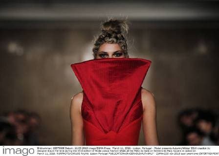 March 11, 2016 - Lisbon, Portugal - Model presents Autumn Winter 2016 creation by designer David Ferreira during the 45rd edition of Moda Lisboa Fashion Week at the Patio da Gale on Terreiro do Paco Square in Lisbon on March 11, 2016. NURPHOTO CARLOS PALMA. Lisbon Portugal  - ZUMAn230