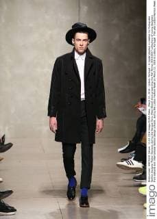 March 11, 2016 - Lisbon, Portugal - A model displays a creation by Portuguese fashion designer Ruben Damasio during the Sangue Novo (New Blood) show presenting the Fall-Winter 2016 2017 collections of young designers from national and international fashion design schools, during the Lisbon Fashion Week on March 11, 2016 in Lisbon, Portugal. This year Lisbon Fashion Week celebrates the 25th anniversary. Lisbon Portugal - ZUMAf123