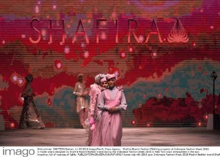 Shafira Muslim Fashion Clothing presents at Indonesia Fashion Week 2016 A model wears designed by Shafira Muslim fashion brand during the Indonesia Fashion Week 2016 in New York town atmosphere in the epic broadway full of nuances of lights.  Azwar