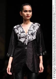 Fashunica by Stephen Tach at Jakarta Fashion Week A model wears the creation of Stephen Tach from Japan with the theme Fashunica , in Indonesia Fashion Week 2016, at Jakarta Convention Center.  NatanaelxPohan