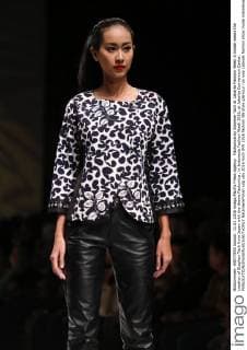 Fashunica by Stephen Tach at Jakarta Fashion Week A model wears the creation of Stephen Tach from Japan with the theme Fashunica , in Indonesia Fashion Week 2016, at Jakarta Convention Center.  NatanaelxPohan