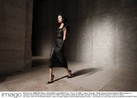 March 12, 2016 - Lisbon, Portugal - Model presents Autumn Winter 2016 creation by designer Carlos Gil during the 45rd edition of Moda Lisboa Fashion Week at the Patio da Gale on Terreiro do Paco Square in Lisbon on March 12, 2016. NURPHOTO CARLOS PALMA. Lisbon Portugal  - ZUMAn230