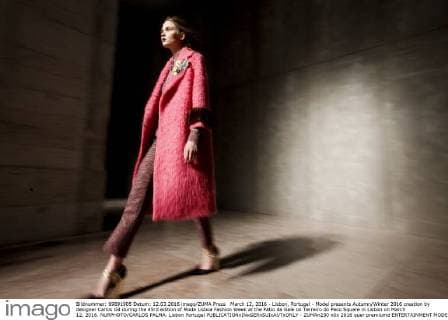 March 12, 2016 - Lisbon, Portugal - Model presents Autumn Winter 2016 creation by designer Carlos Gil during the 45rd edition of Moda Lisboa Fashion Week at the Patio da Gale on Terreiro do Paco Square in Lisbon on March 12, 2016. NURPHOTO CARLOS PALMA. Lisbon Portugal  - ZUMAn230