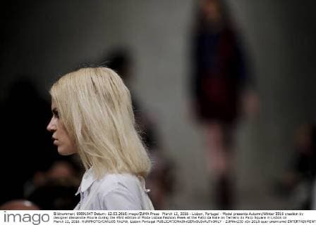 March 12, 2016 - Lisbon, Portugal - Model presents Autumn Winter 2016 creation by designer Alexandra Moura during the 45rd edition of Moda Lisboa Fashion Week at the Patio da Gale on Terreiro do Paco Square in Lisbon on March 12, 2016. NURPHOTO CARLOS PALMA. Lisbon Portugal  - ZUMAn230