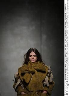 March 12, 2016 - Lisbon, Portugal - Model presents Autumn Winter 2016 creation by designer Alexandra Moura during the 45rd edition of Moda Lisboa Fashion Week at the Patio da Gale on Terreiro do Paco Square in Lisbon on March 12, 2016. NURPHOTO CARLOS PALMA. Lisbon Portugal  - ZUMAn230