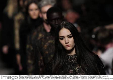 March 12, 2016 - Lisbon, Portugal - Models present Autumn Winter 2016 creation by designer Alexandra Moura during the 45rd edition of Moda Lisboa Fashion Week at the Patio da Gale on Terreiro do Paco Square in Lisbon on March 12, 2016. NURPHOTO CARLOS PALMA. Lisbon Portugal  - ZUMAn230