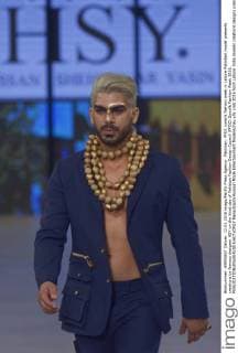 Pakistan: PFDC sunsilk fashion week in Lahore Pakistani model presents creations by famous designer HSY on the third day of Pakistan Fashion Design Council (PFDC) Sunsilk Fashion Week 2016.  RanaxSajidxHussain