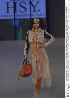 Pakistan: PFDC sunsilk fashion week in Lahore Pakistani model presents creations by famous designer HSY on the third day of Pakistan Fashion Design Council (PFDC) Sunsilk Fashion Week 2016.  RanaxSajidxHussain