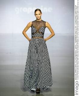 (160312) -- JOHANNESBURG, March 12, 2016 -- A model presents a creation from local brand Grapevine on the third day of Mercedes-Benz Fashion Week Joburg 2016 at Nelson Mandela Square in Johannesburg, South Africa on March 12, 2016. The Mercedes-Benz Fashion Week Joburg 2016, the largest and leading one in Africa, closed here Saturday. Creations by nearly 20 South African fashion designers have been presented in 14 shows of the past three days. ) SOUTH AFRICA-JOHANNESBURG-FASHION WEEK-CLOSING ZhaixJianlan 