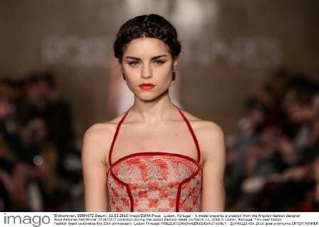 Lisbon, Portugal - A model presents a creation from the Angolan fashion designer Rose Palhares Fall Winter 2016 2017 collection during the Lisbon Fashion Week on March 11, 2016 in Lisbon, Portugal. This year Lisbon Fashion Week celebrates the 25th anniversary. Lisbon Portugal - ZUMAf123