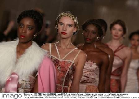 Lisbon, Portugal - Models present creations from the Angolan fashion designer Rose Palhares Fall Winter 2016 2017 collection during the Lisbon Fashion Week on March 11, 2016 in Lisbon, Portugal. This year Lisbon Fashion Week celebrates the 25th anniversary. Lisbon Portugal - ZUMAf123